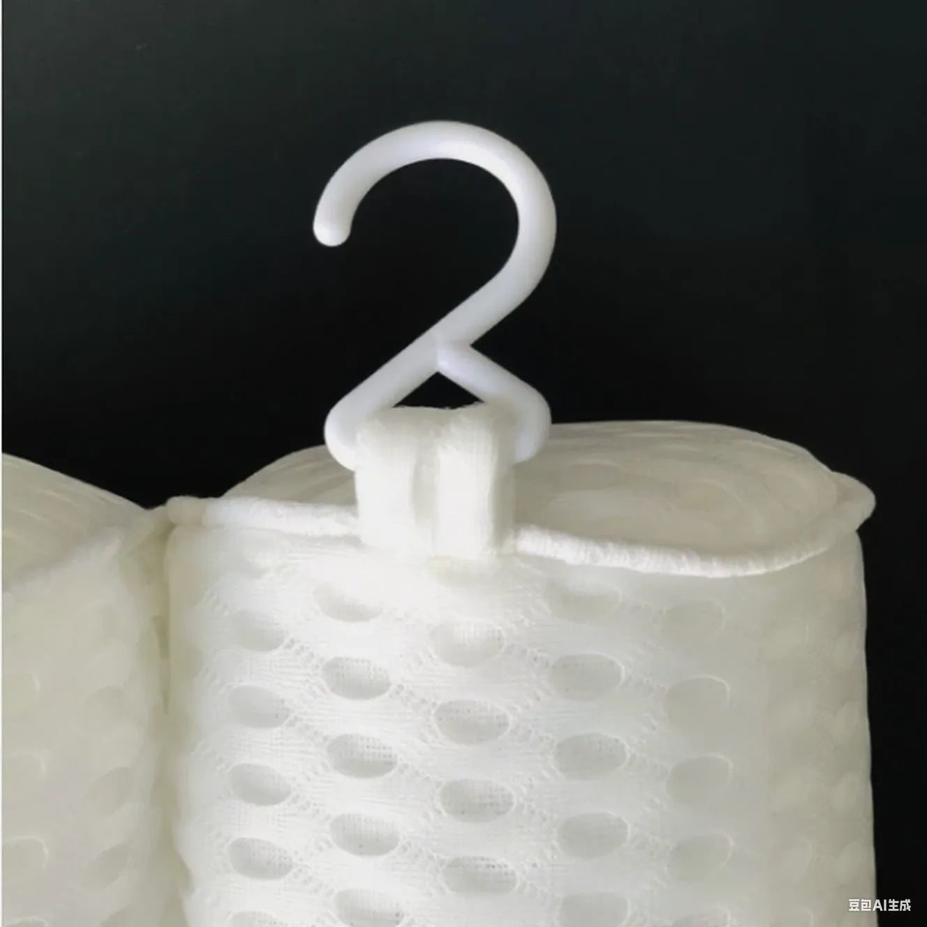 White bathtub pillow with 4D mesh and suction cups on a 3D material surface