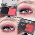 Two-tone eyeshadow palette showing five colour combinations including pink and black shades