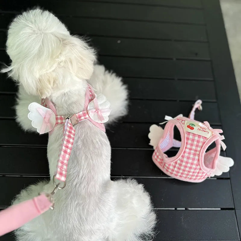 Pink cotton chest-back dog harness with a top handle for a small dog.