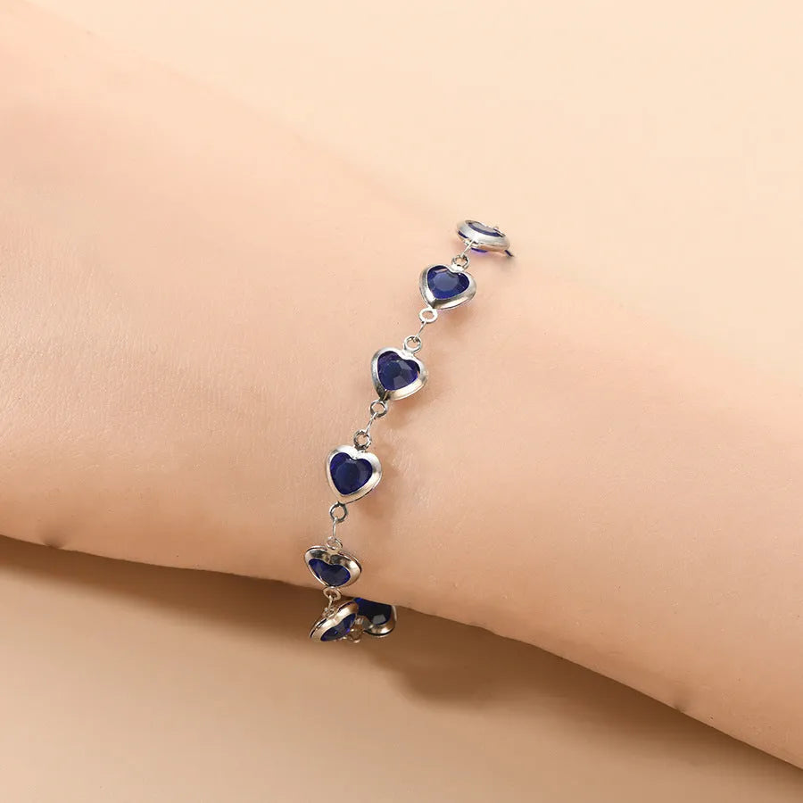 Devil's Eye geometric heart-shaped stainless steel bracelet in an electroplated colour on a white background.