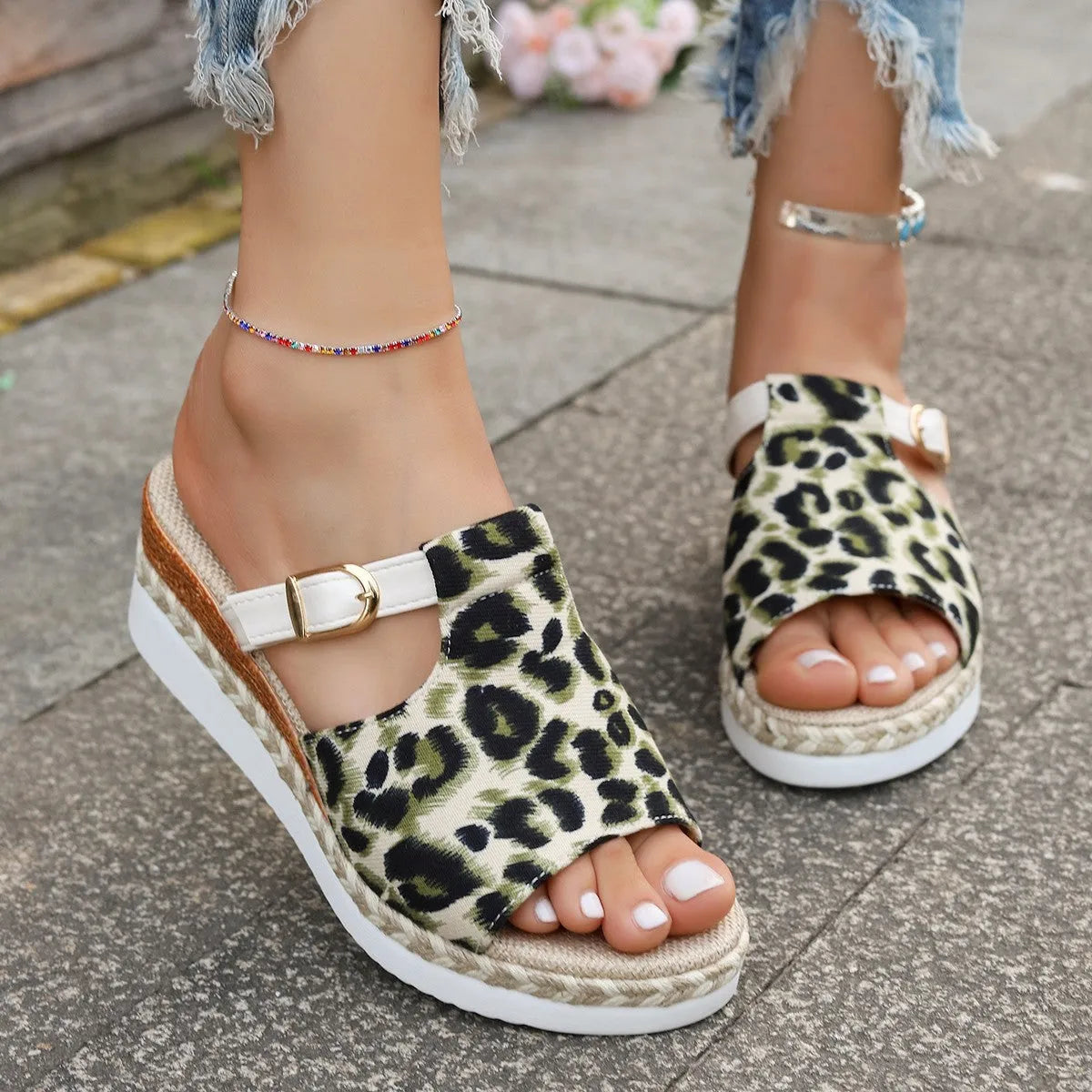 Leopard print wedge platform sandals with a fish mouth toe bracket, in light green.