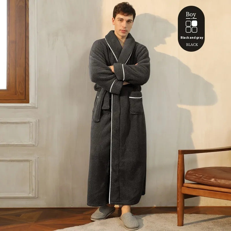 A man and woman wearing matching thickened flannel couple's bathrobes in a winter colour.