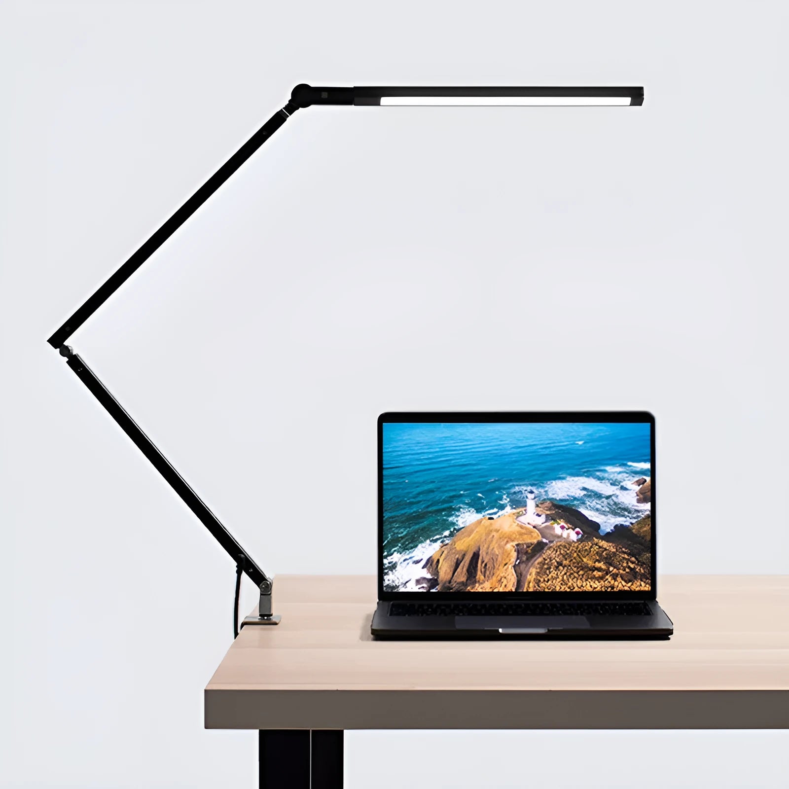 Aluminium clip-on folding desk lamp with remote control, shown in dazzling black finish.