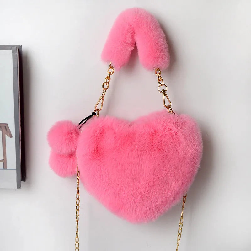 Soft plush heart-shaped women's handbag in medium size with zipper closure