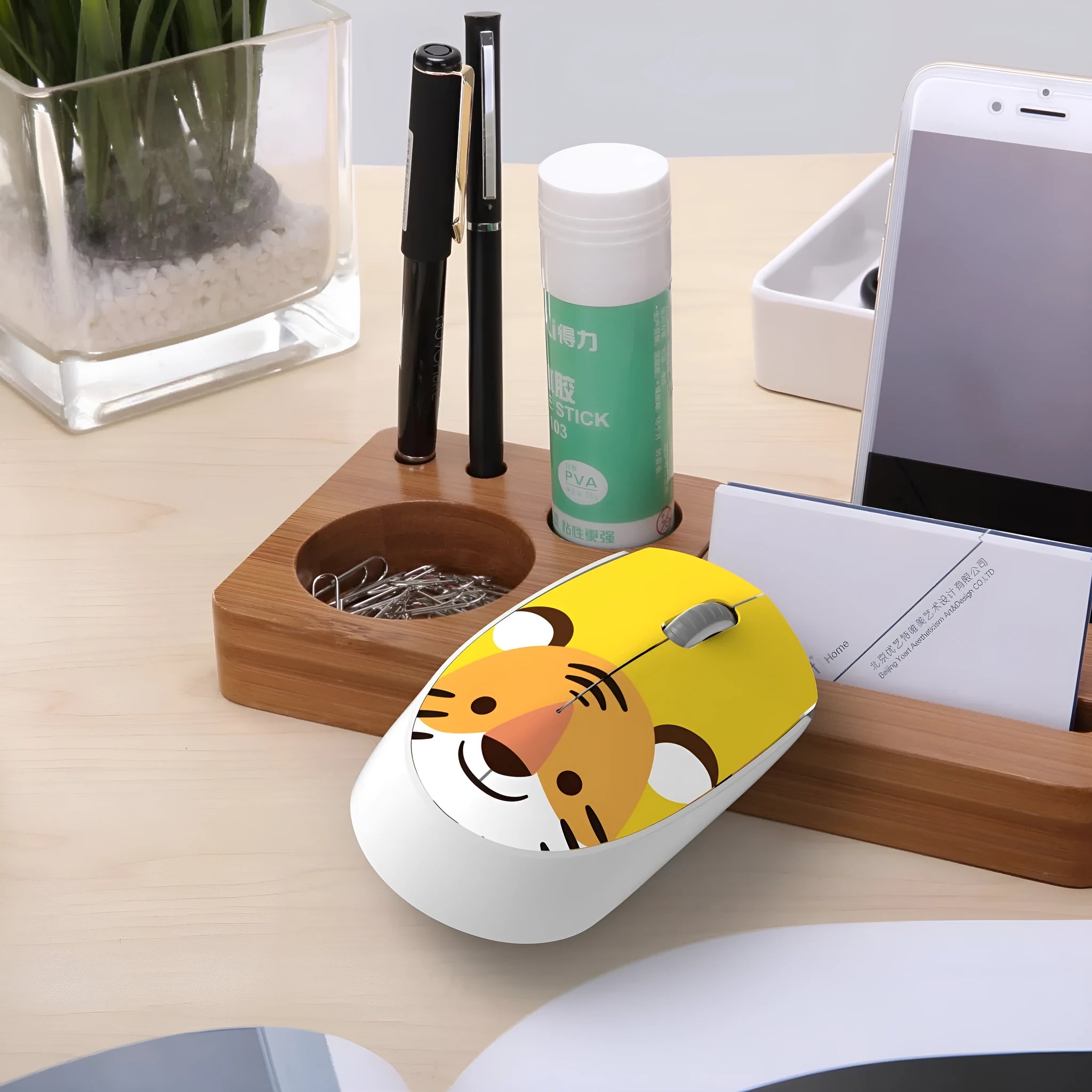 A compact wireless USB mouse for laptops shown in a blue rabbit character design.