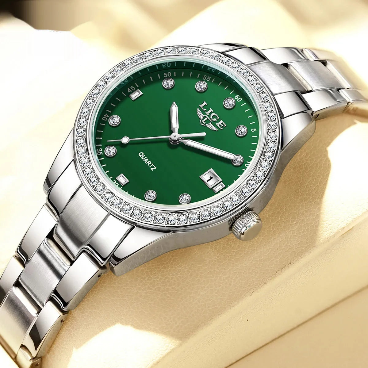Silver fashion watch with diamond dial, luminous hands, and stainless steel case.