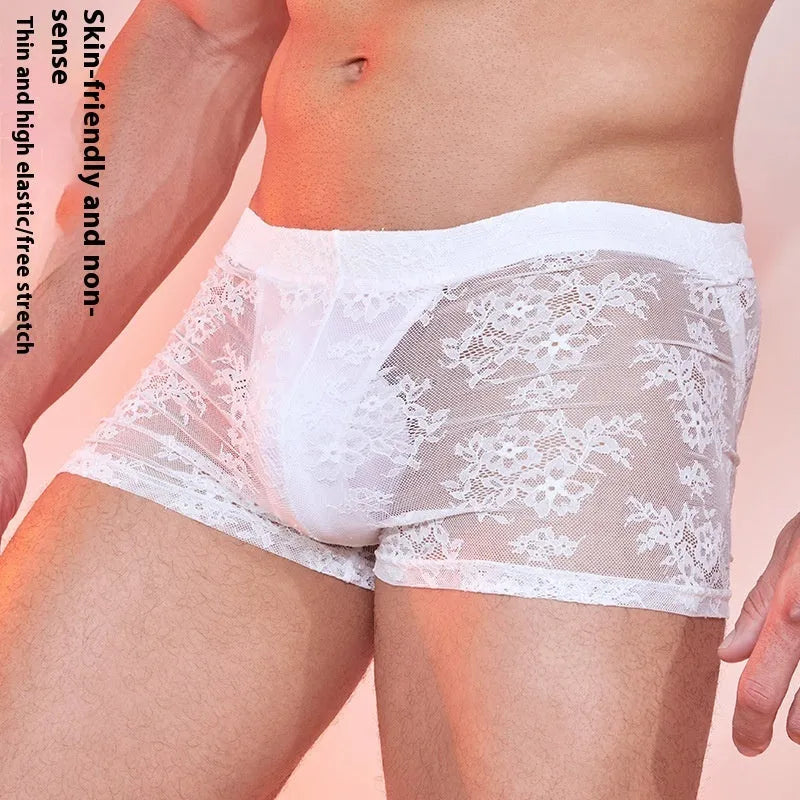 Men's black boxers with lace design detail on a hanger