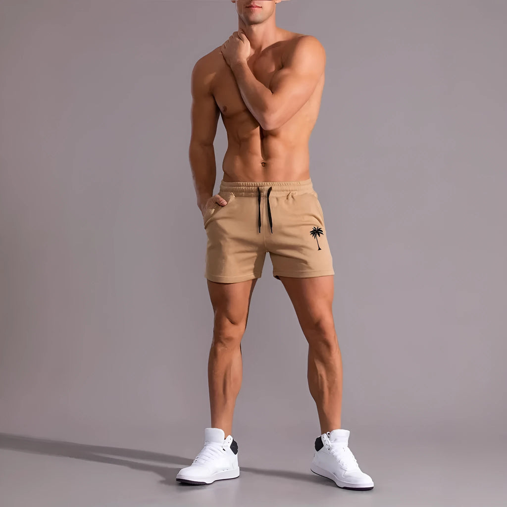 Men's khaki coconut printed sports shorts with straight leg design and micro elastic fabric