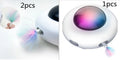 White UFO electric cat turntable toy with feather accessories on floor