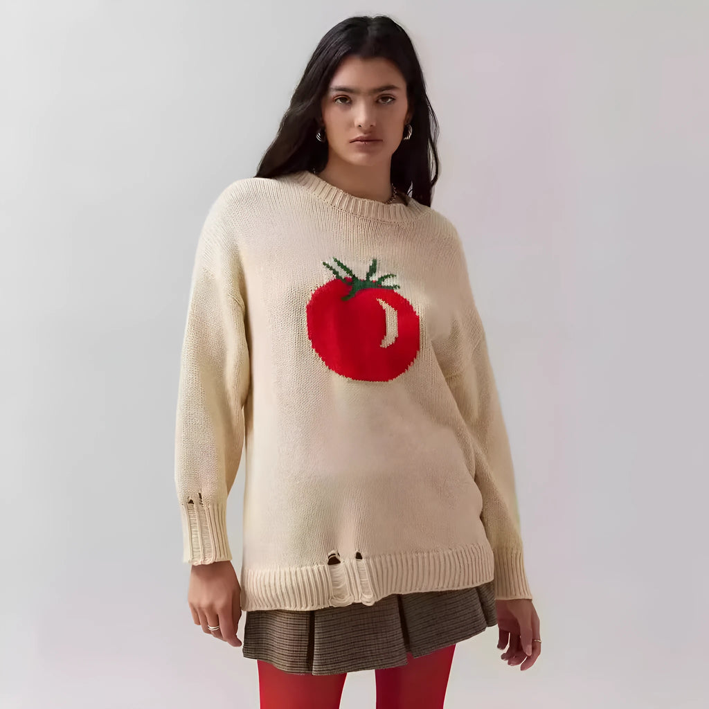Beige women's loose-fitting acrylic jacquard pullover sweater with round neck and long sleeves.