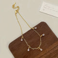 Women's zircon jewellery set with geometric pendant necklace, earrings and anklet