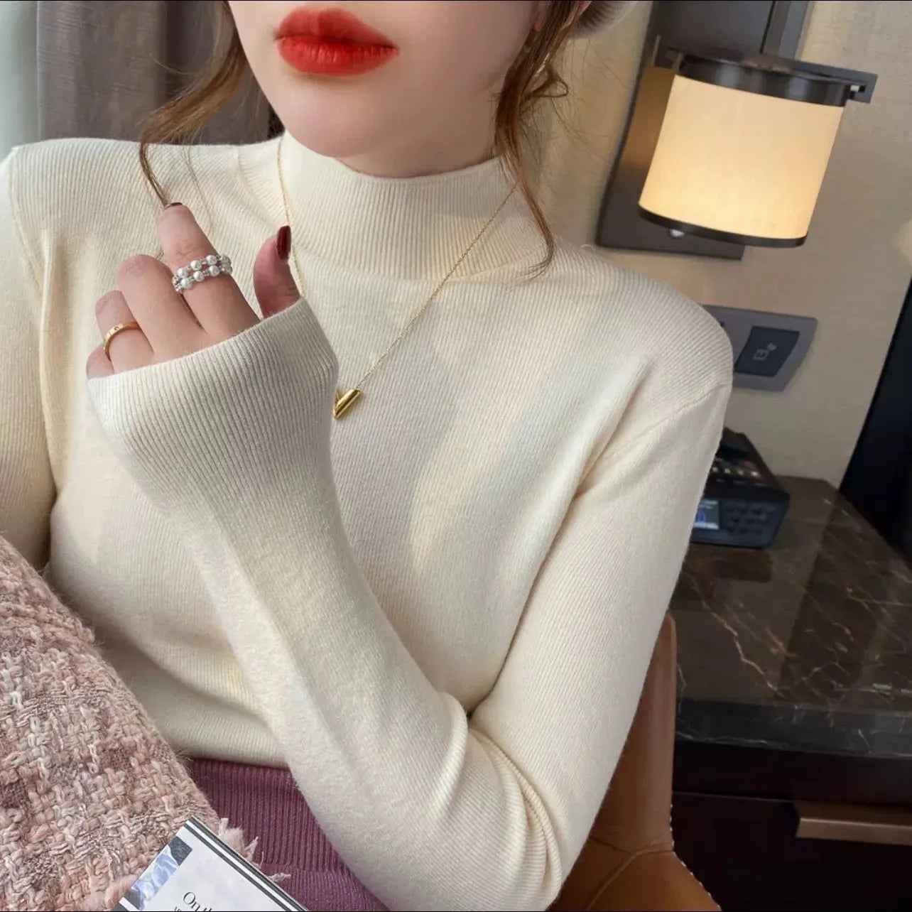 Slim fit long sleeve knitted top in viscose fibre available in multiple colours with Western style design