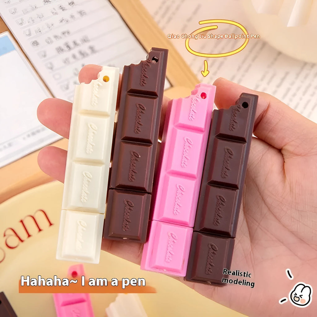 Chocolate ballpoint pen with cartoon food design in pink, beige, and brown colours