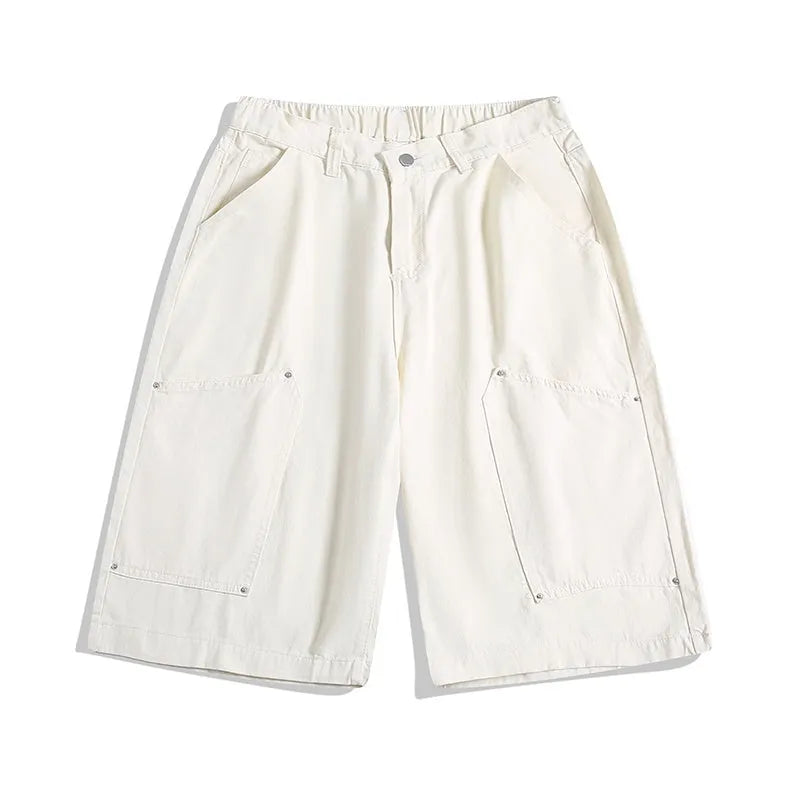 Woman wearing apricot coloured wide-leg cropped casual pants with a mid waist and elasticated band.