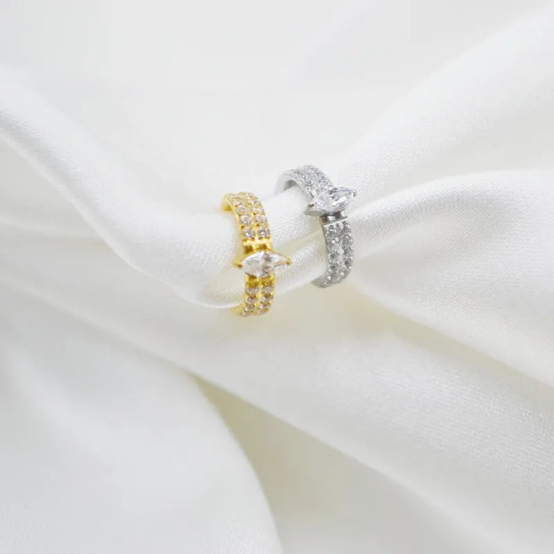 Titanium steel heart-shaped earrings with zircon stones in gold and silver colours