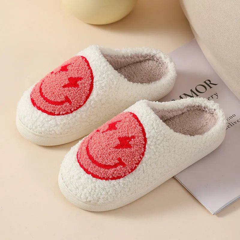 Women's plush cartoon love style home slippers with a non-slip PVC sole.