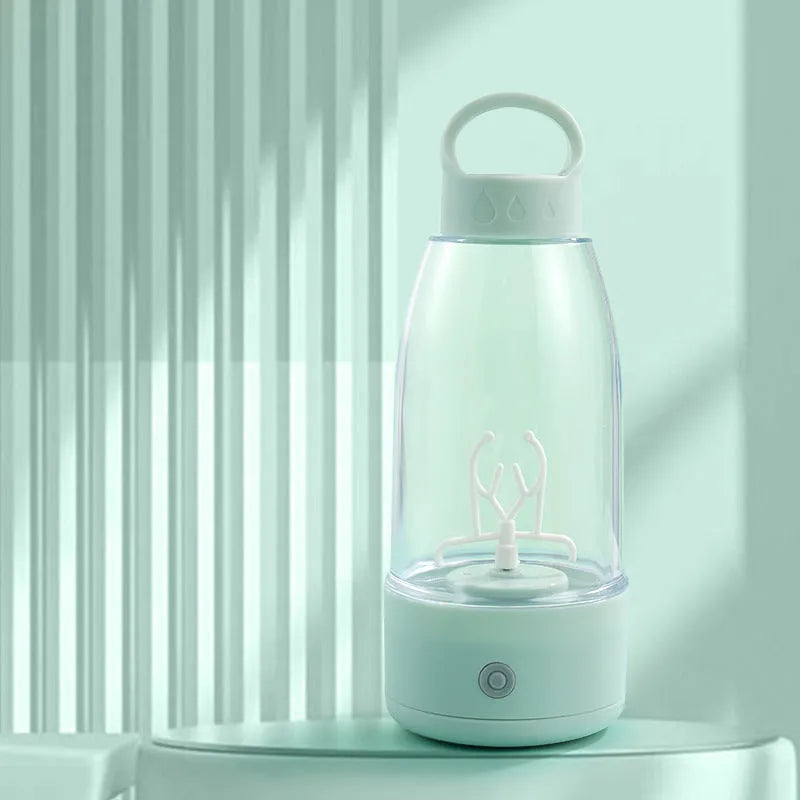 Green automatic electric shaker bottle with USB port, handle, and 380ml capacity.