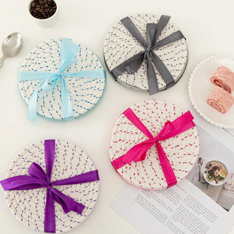 Cotton cord round coaster set showing three 18cm diameter placemats in modern colour options