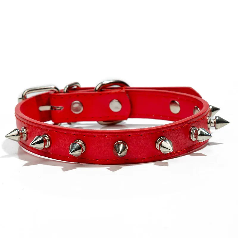 A spiked dog collar made of black PU leather with metal studs and an alloy metal buckle.