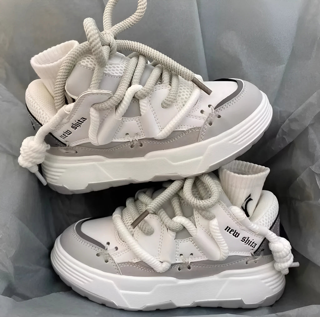Women's chunky platform sneakers with 6-8cm heel in grey, showing round toe and front tie-up closure