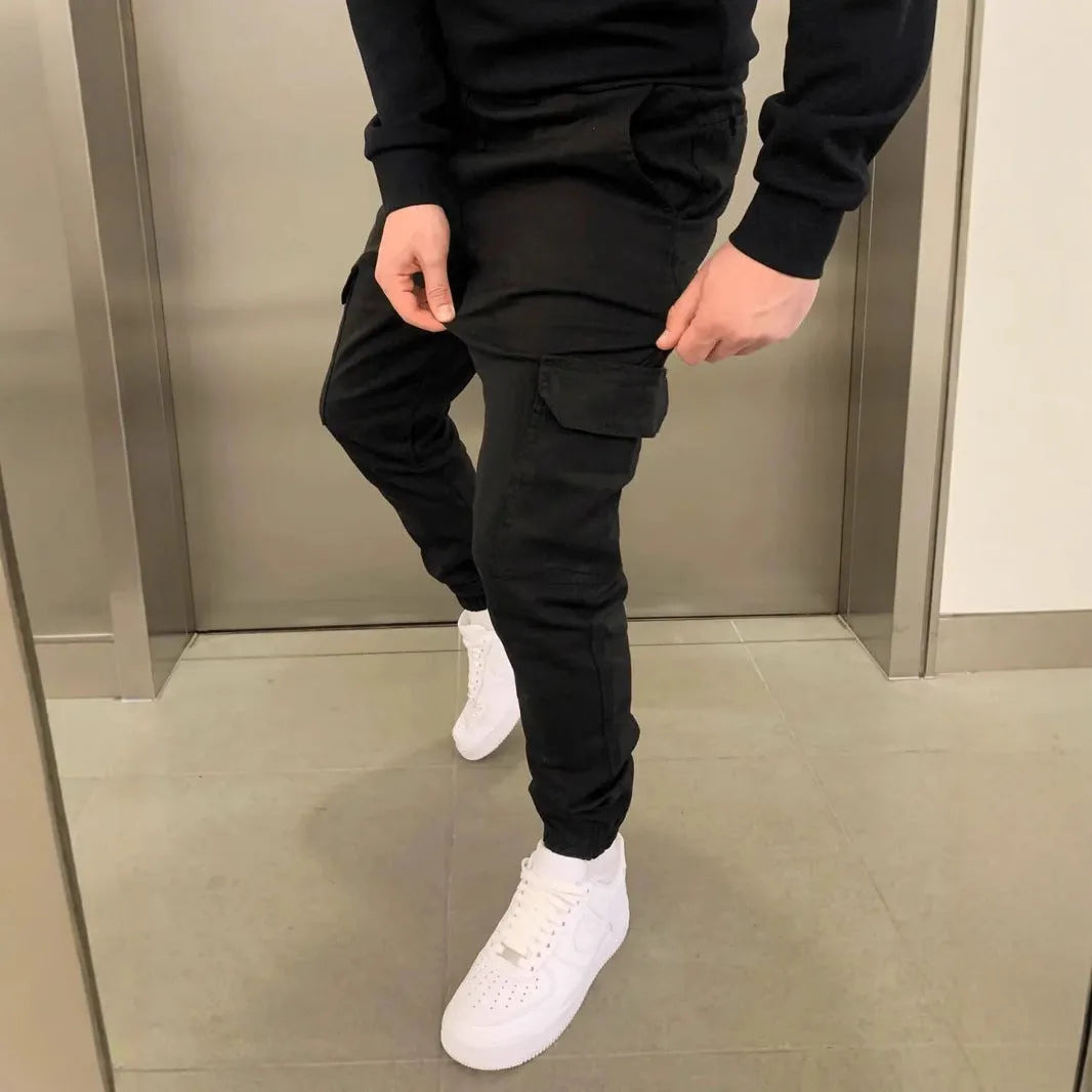 Men's polyester overalls with dimensional patch pockets and elastic waistband in straight leg baggy pants style