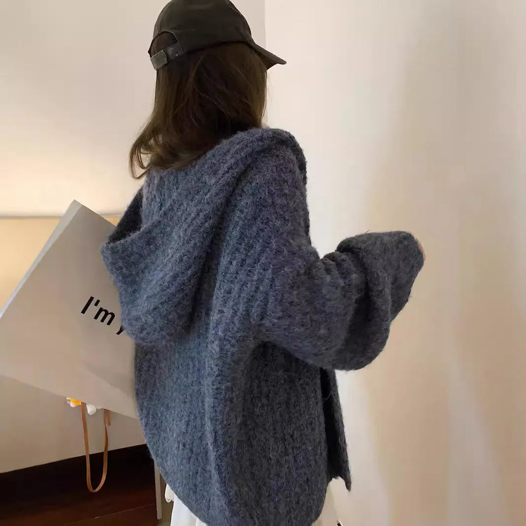 Women's loose hooded cardigan in thick acrylic blend, shown in dark grey, brown, and milky white.