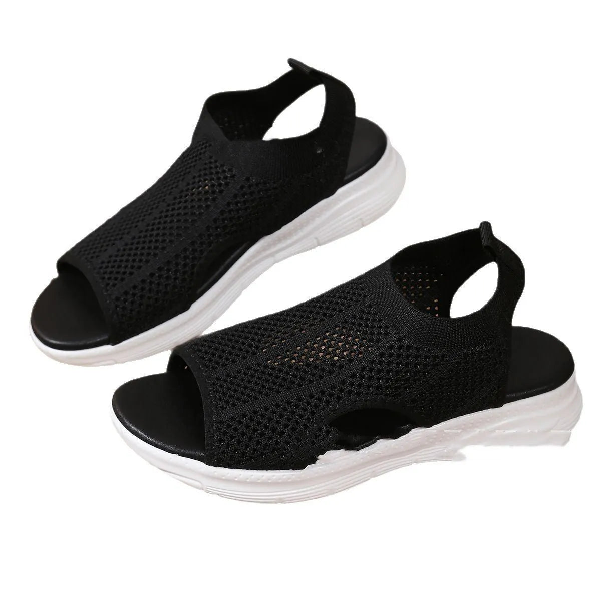 Women's black platform sports sandals with a flat toe and mesh lining on a rubber sole.