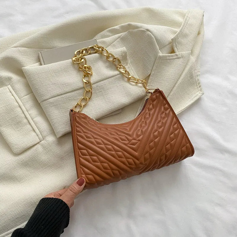 Soft PU leather pleated chain baguette shoulder bag in a vertical square shape, shown in brown colour.