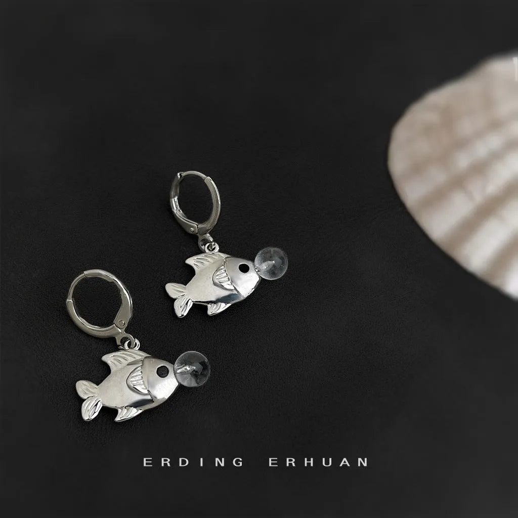 A pair of goldfish-design bubble fish earrings made from electroplated copper.