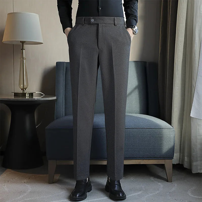 Men's straight fit brown corduroy trousers with elastic waistband on hanger