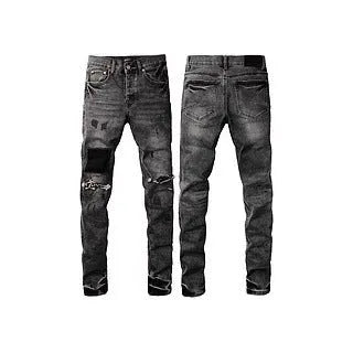 A pair of black slim fit skinny jeans with a straight leg and button fly closure on a mannequin.