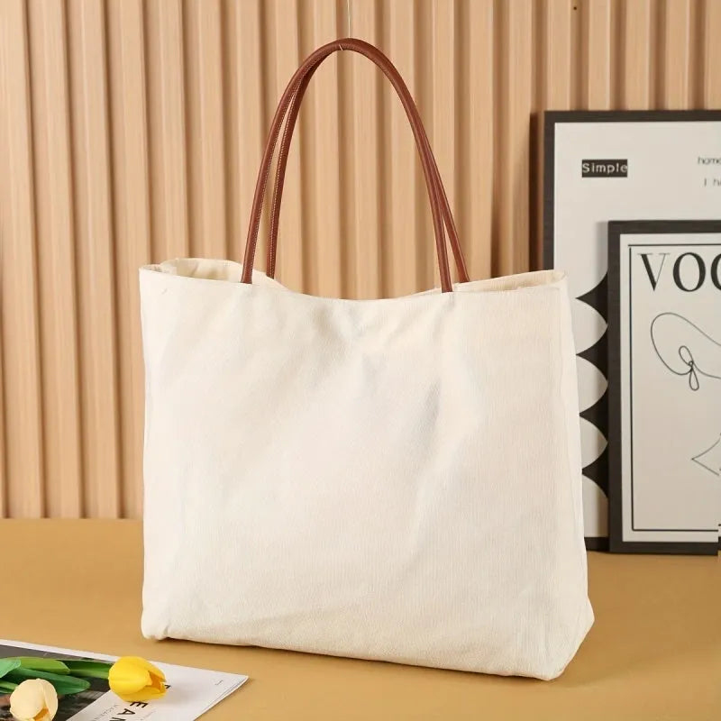 Beige White or White canvas tote bag with durable handles and a spacious main compartment
