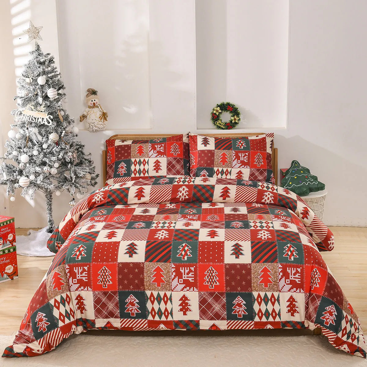 Red plaid pattern Christmas themed bedding three-piece set showing quilt cover and pillowcases.