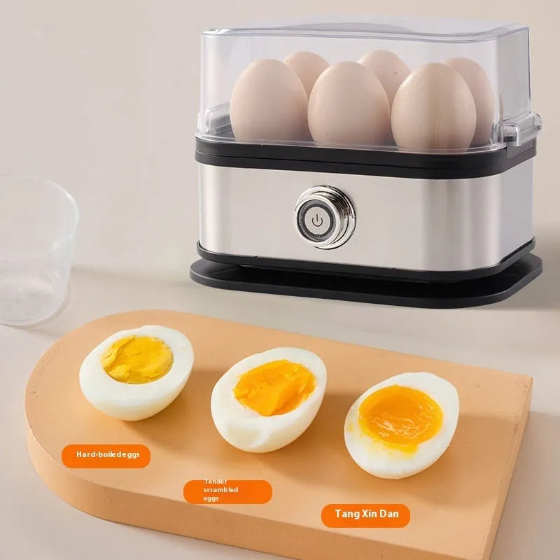 Black portable stainless steel mini egg boiler for kitchen and travel use.