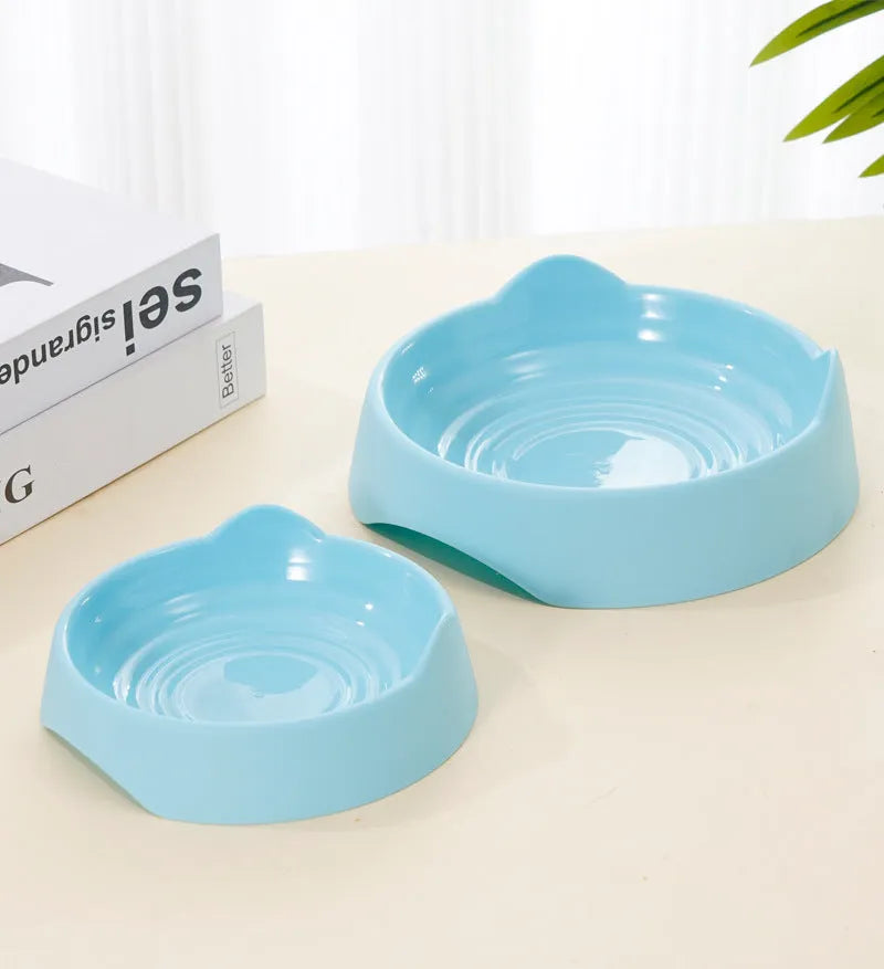 Blue ceramic dog slow feeder bowl with maze design for large breed dogs.