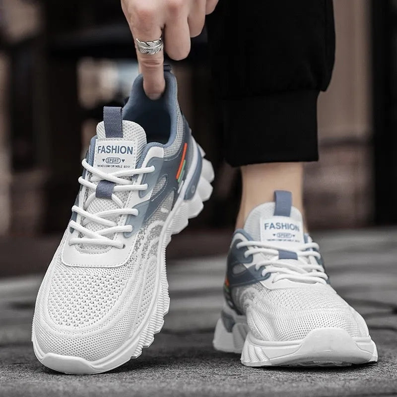 Men's white blue and black platform casual running shoes with cross shoulder straps and rubber sole.