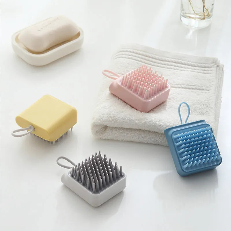 Pet bath massage brush with soft TPR bristles and ergonomic handle in white, blue, pink, yellow colours