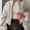 Women's off-shoulder short coat with lantern sleeves in brown polyester fabric