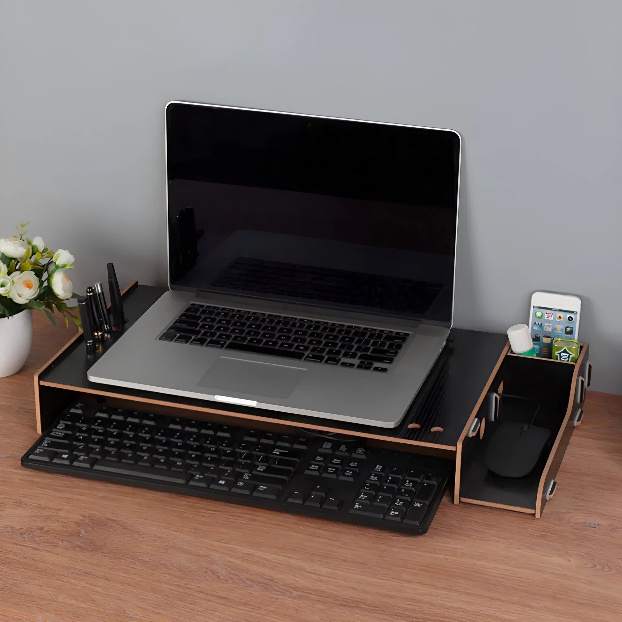 Paper laptop cooling rack in black on desktop showing 28x56x8.5cm dimensions