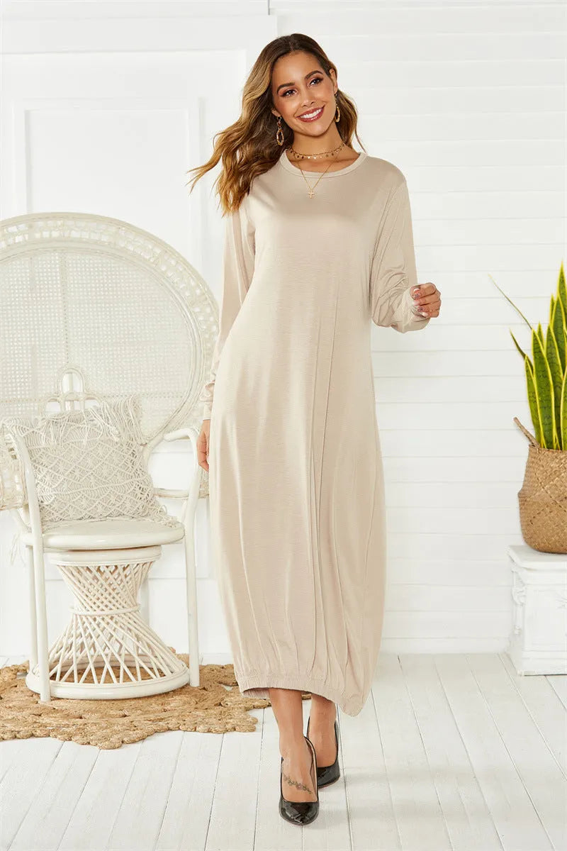 Black loose lace-up crew neck lantern dress with thread accents on hanger