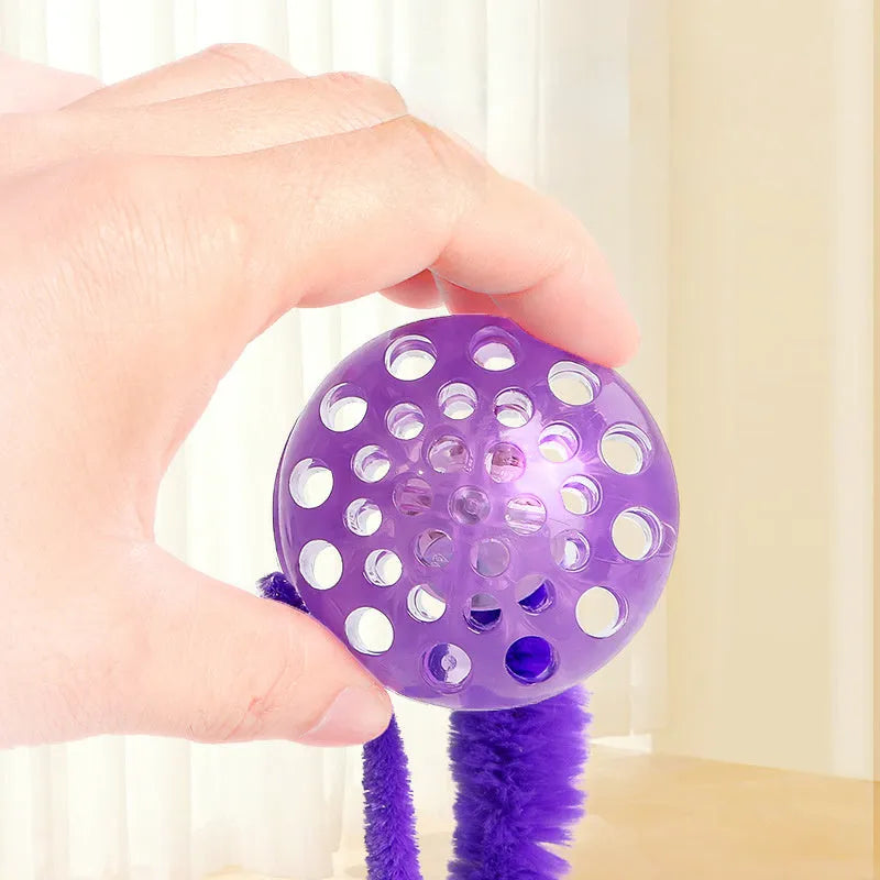Interactive bouncing cat toy with plush worm tail in green, pink, or purple colour options