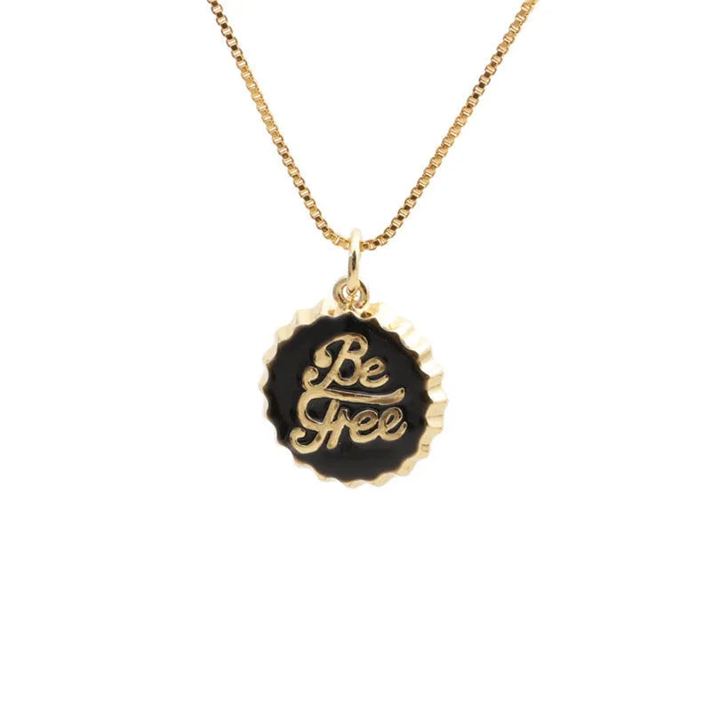 Copper bottle cap pendant necklace with gold plating on a 40cm box chain.
