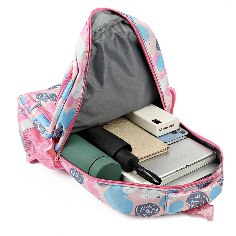 Blue student backpack with air cushion shoulder straps, large main compartment and Oxford cloth material.