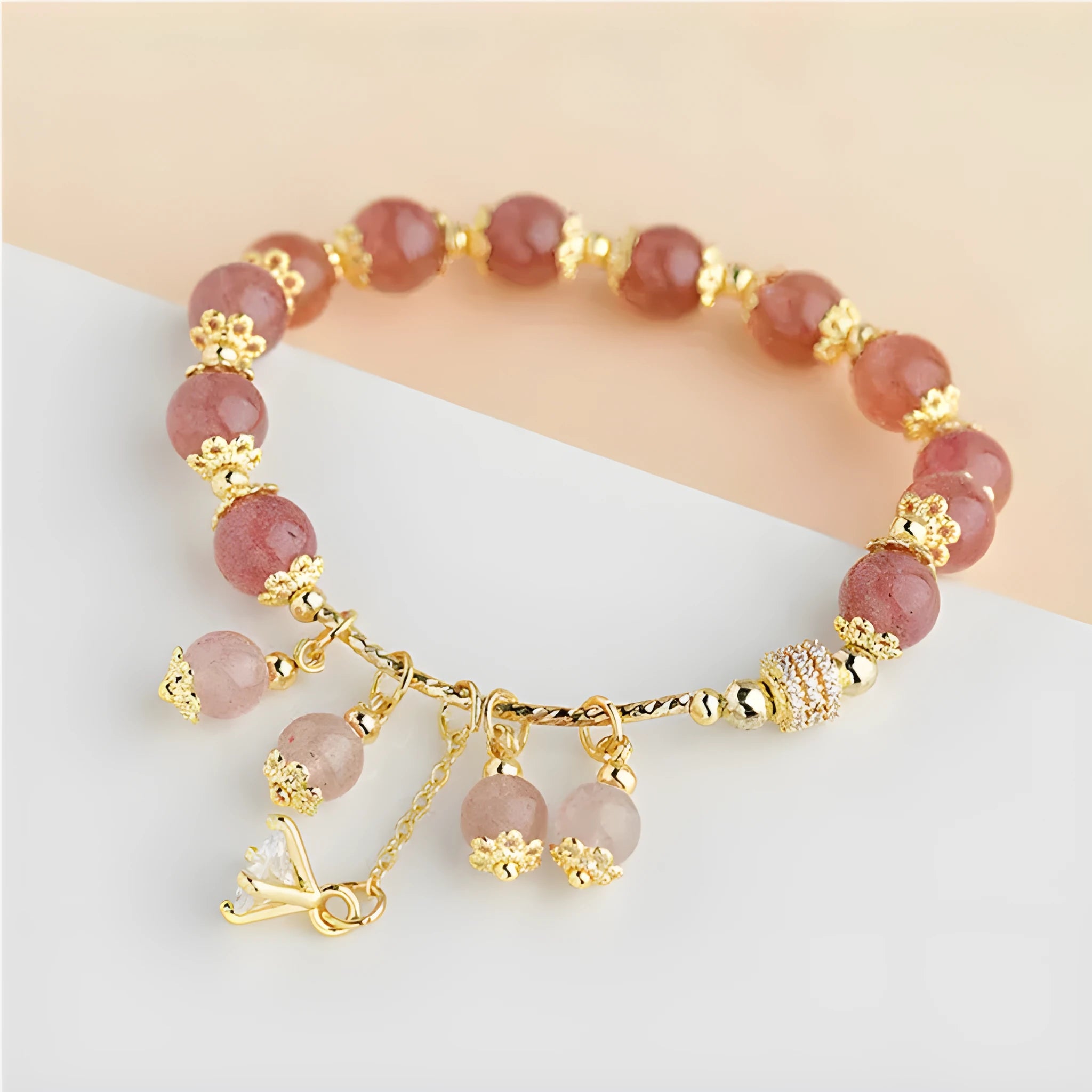 Pink strawberry quartz heart-shaped women's bracelet with natural pearl accents