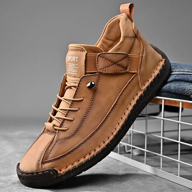 Men's mid-calf black Martin boots with tooling stitching and a flat rubber sole on a white background.