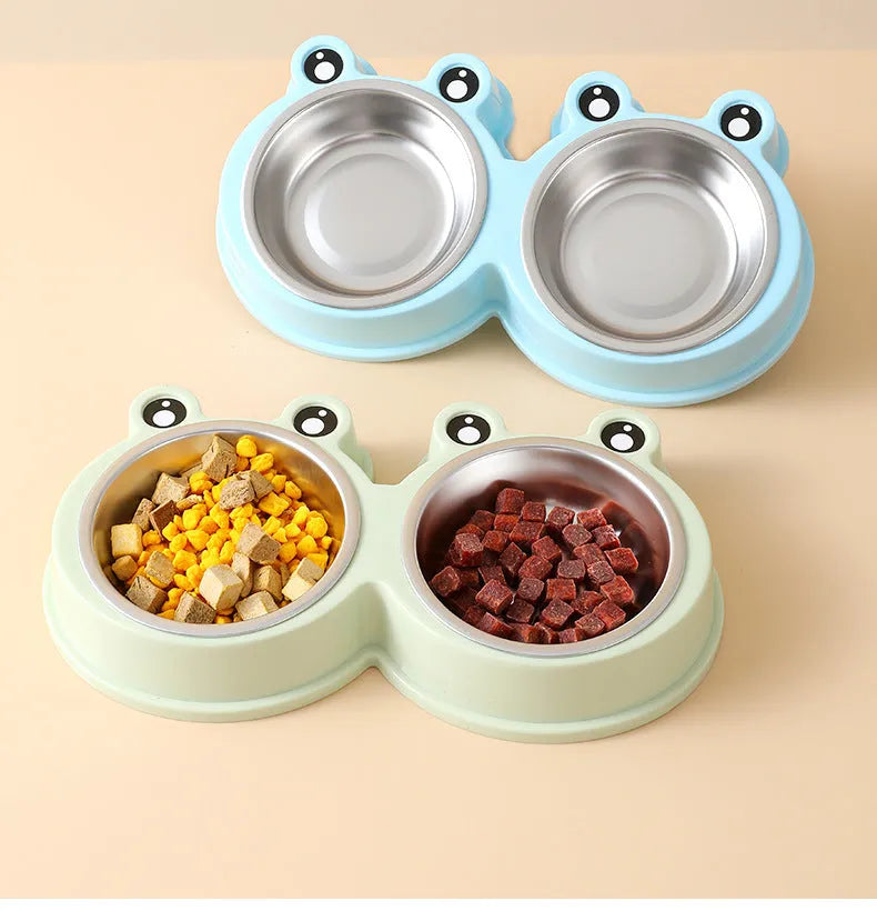 Stainless steel double pet bowl set with anti-slip frog base in blue, for cat or dog food and water.