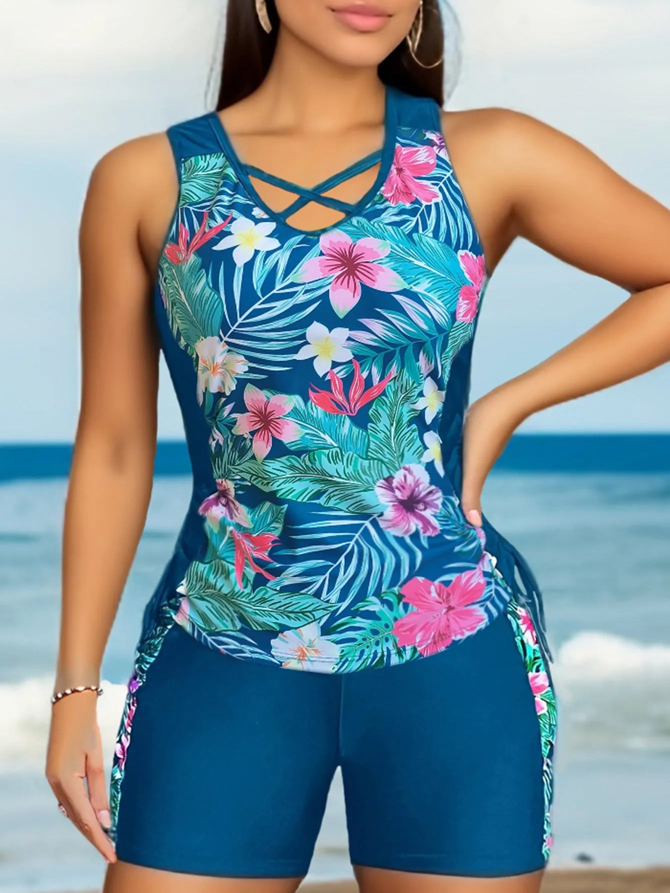 Plus size women wearing a floral printed high-waisted bikini in navy blue
