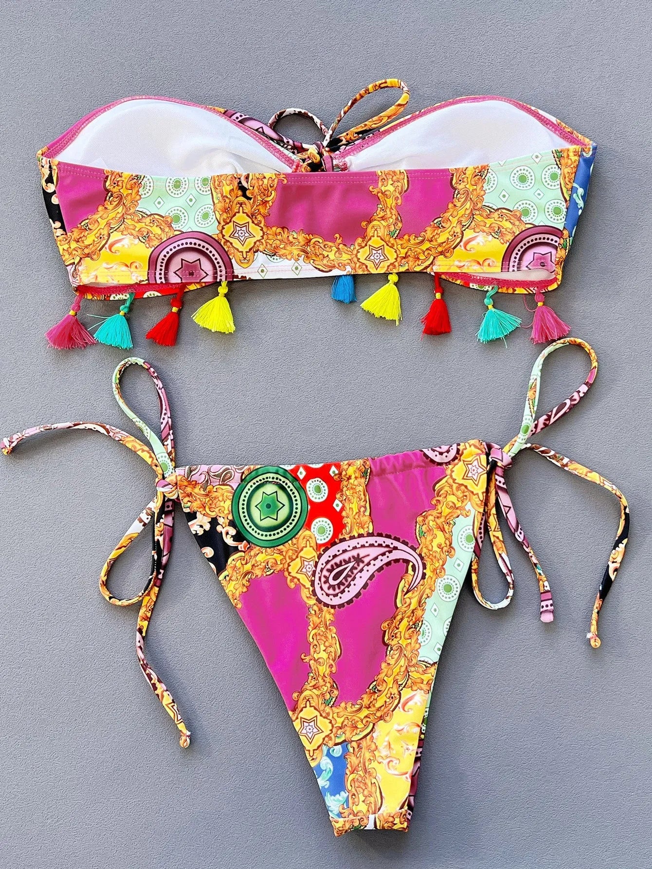 Women's printed separated tube top bikini set for swimming in blue pattern.