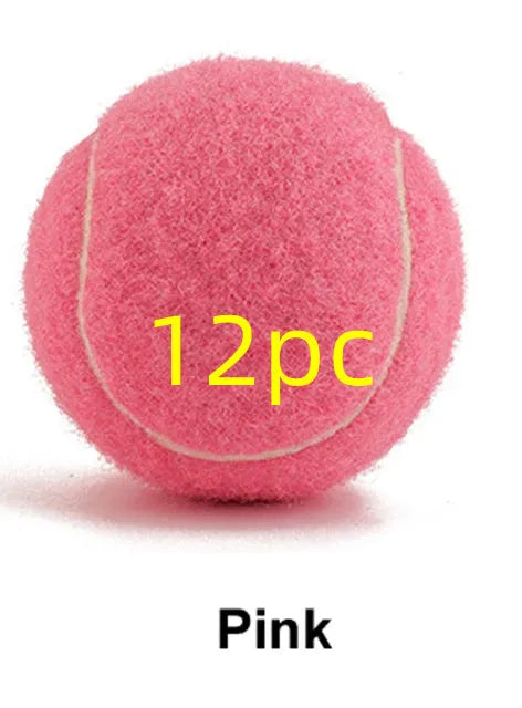 6.3 cm diameter solid rubber dog tennis ball in assorted bright colours on a green lawn.
