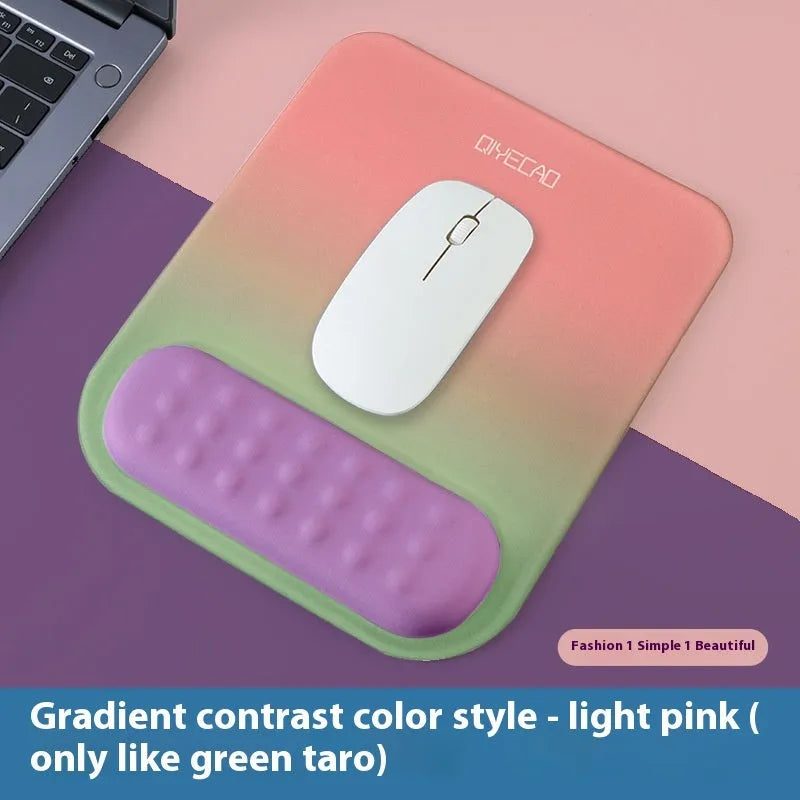 Ergonomic cloth silicone mouse pad with raised wrist support in mint green colour.